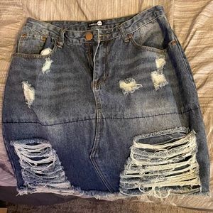 Denim skirt, stops right above knee.